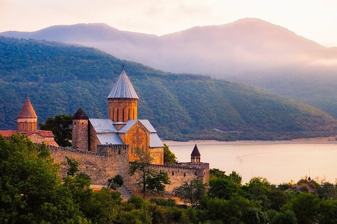 Bestseller Day Trip to Kazbeg/Gergeti Delicious Lunch at Rooms - Russian Georgian Friendship Monument: A Panorama With a Story