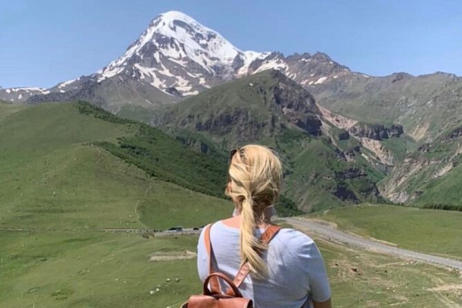 Day tour to mountains Jinvali lake, Ananuri, Kazbegi, Arch friendship - Kazbegi Mountains and the Gergeti Trinity Church: the emotional high point