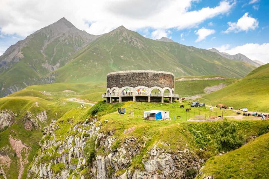 Discover Ananuri, Gudauri, & Kazbegi Guided Day Tour - Gudauri Viewpoint: Friendship Monument and Devil’s Valley Views