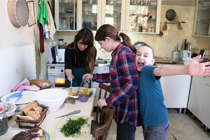 Enjoy a Traditional Georgian Cooking Class and Meal with a Local in Tbilisi - Sharing the Meal at the Family Dining Table