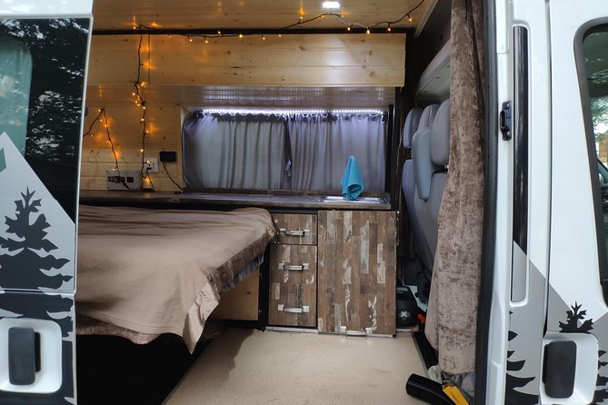 Ford Transit AWD Camper van rental in Georgia - Air-Conditioned Transport: Comfort You Can Use Year-Round
