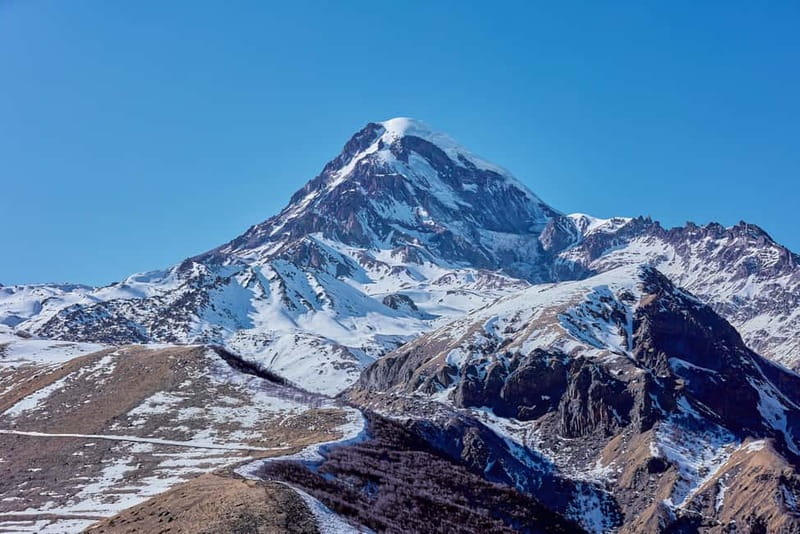 From Tbilisi: Ananuri, Gudauri, and Kazbegi Tour with Guide - Zhinvali Reservoir: turquoise views and a panoramic reset