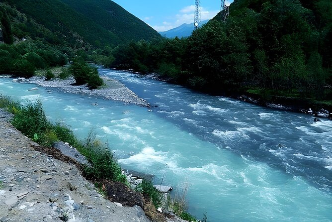 From Tbilisi Daytrip Kazbegi Gudauri & Zhinvali Guided Group Tour - Pasanauri: the two-river confluence and a food-friendly pause