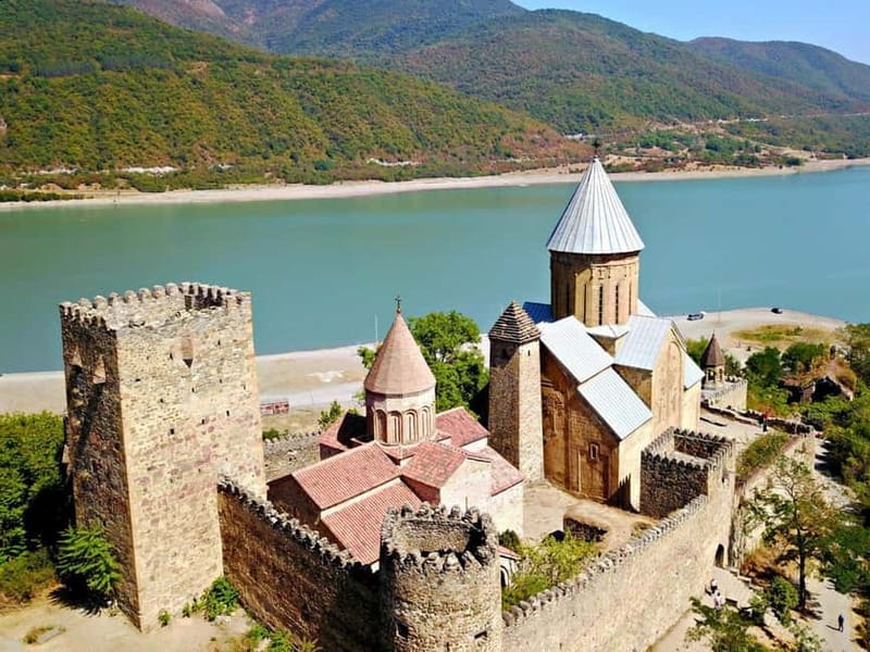 From Tbilisi: Kazbegi, Gudauri & Gergeti Group Day Tour - Gergeti Trinity Church: The Hilltop Payoff, plus the Optional Jeep