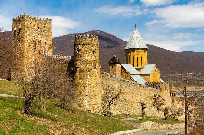 Georgia’s Historic Wonders: Private Zhinvali, Gergeti Exploration - Gergeti Trinity Church in the Kazbegi Mountains: a remote 14th-century viewpoint