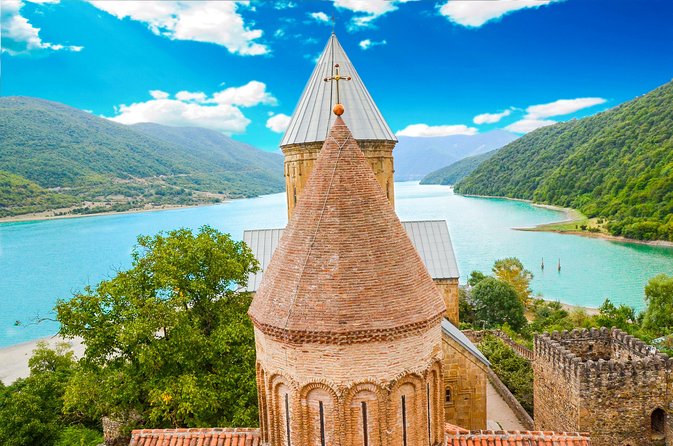 Highlights of Caucasus Mountains-Jinvali,Ananuri,Gudauri,Kazbegi(Group tour) - Gudauri: mountains, optional paragliding, and seasonal snow fun