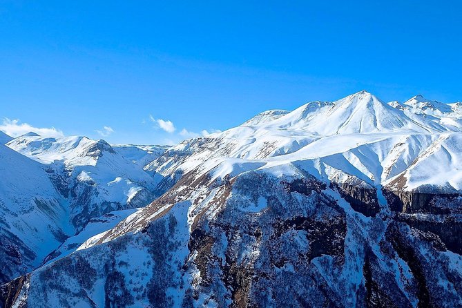 Kazbegi, Gergeti and Ananuri Full Day Tour from Tbilisi - Getting to Gergeti Trinity Church: The Main Event Above Mount Kazbek