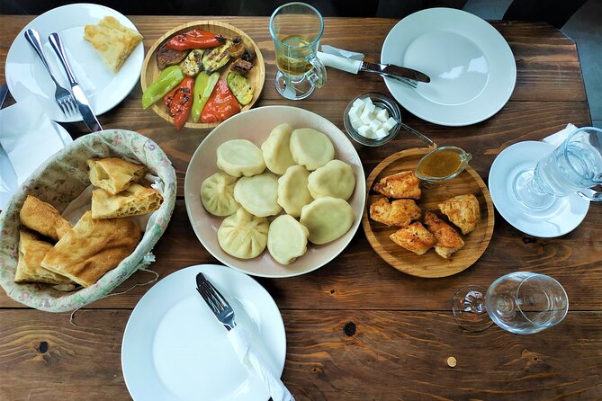 Kazbegi Tour with Gergeti Church, Waterfall Hike & Hidden Gems - Stepantsminda Lunch Break: Local Family Option or Menu Restaurant