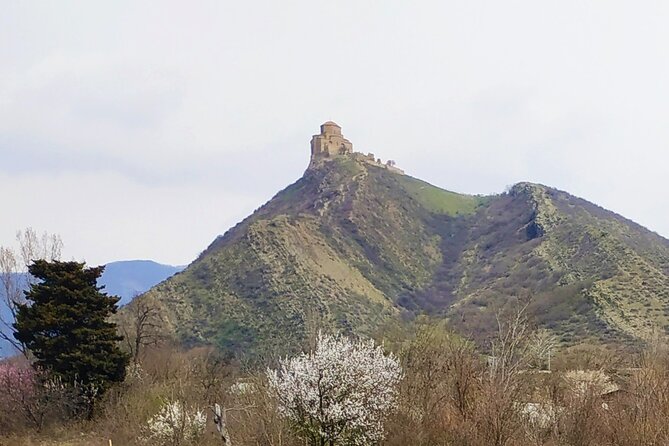 Mtskheta Tour with All UNESCO Sites & Ancient Ruins - Stop 1: Jvari Church, the mountaintop that explains the setting