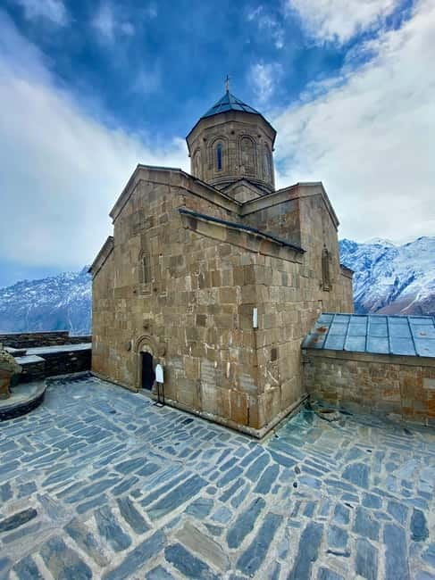 Private day trip to Stepantsminda, Kazbegi Mountains & Sno - Down Into Stepantsminda Country: Jvari Pass and Dariali Monastery