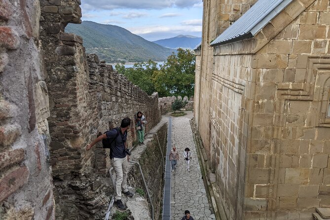 Private Full Day Trip to Kazbegi Mountains - The Russia-Georgia Friendship Monument and its 600 meter cliff moment