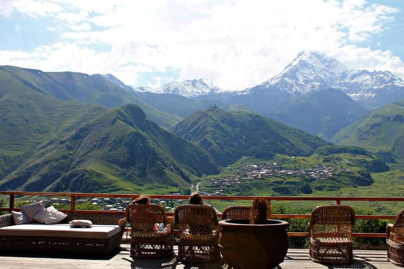Roads were made for journeys, not the destinations. - Sno village boulders: portraits, Kazbek, and Chaukhi views