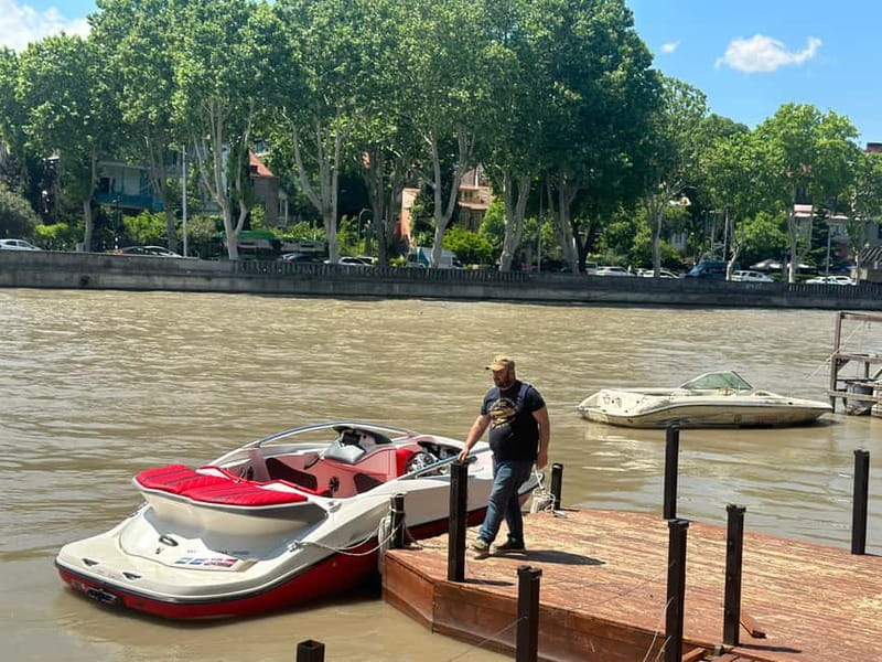 Tbilisi Boat Tour: Private Exciting Boat Trip in Old City - A waterfall moment inside a busy center