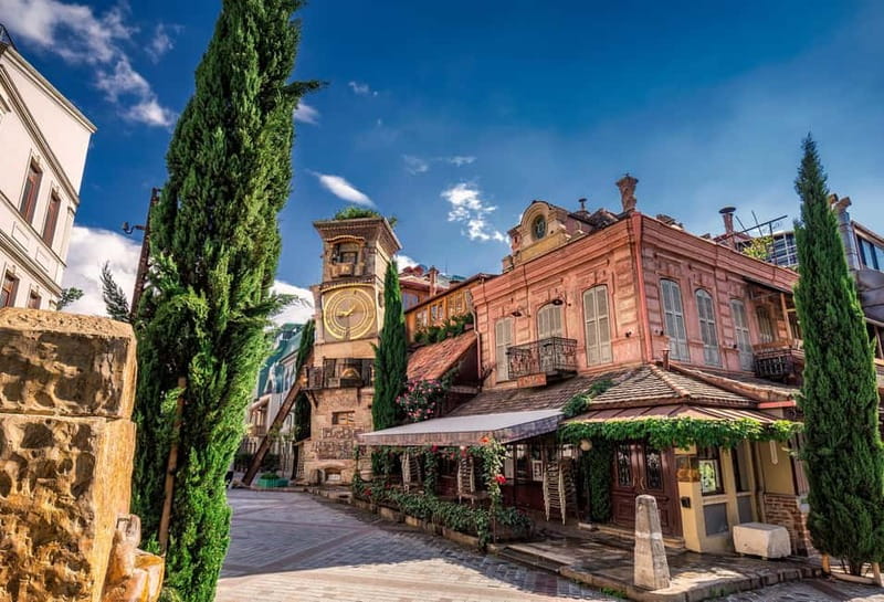 Tbilisi: Historic & Modern City tour with 2 Cable Car rides - Old Town start: Narikala Castle, the clock tower, and Bridge of Peace
