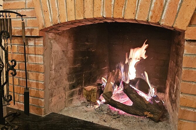 Tbilisi Private Dinner: Georgian BBQ & Fireplace - Wine, chacha, and the invitation to the cellar