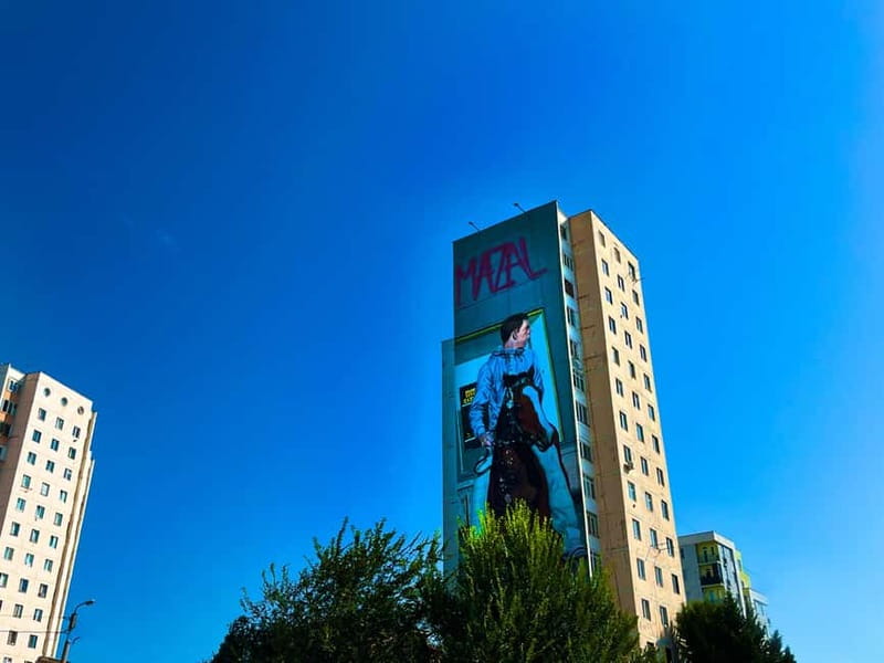 Tbilisi: Soviet Suburbs and Murals Exhibition Guided Tour - Fabrika Hostel yard, where street art starts before you even walk