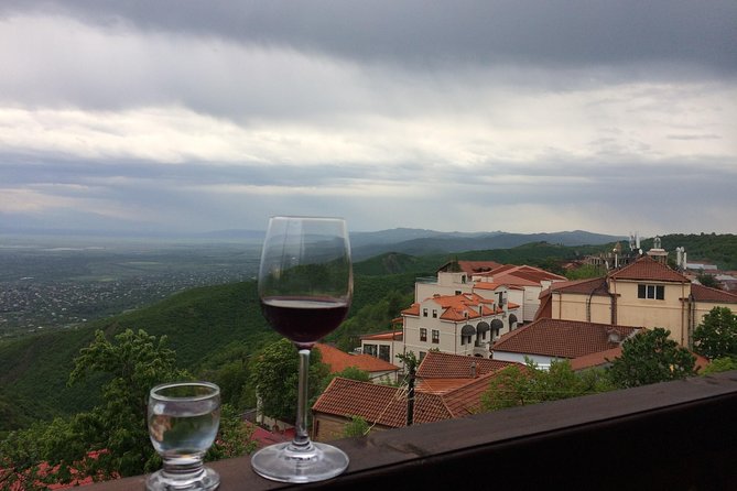 Two Days in Gorgeous Wine Region with Full board Meals and Tastings From Tbilisi - Day 1 in Kakheti: Organic Cellars, Sighnaghi Streets, and a Proper Lunch