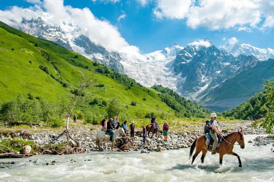 Ushguli: Horse Riding Tour to Shkhara Glacier - Getting on horseback in UNESCO Ushguli